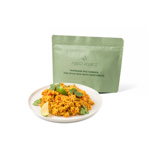 Plate of Thai-style rice with vegetables and a green 'Food Force' package in the background.