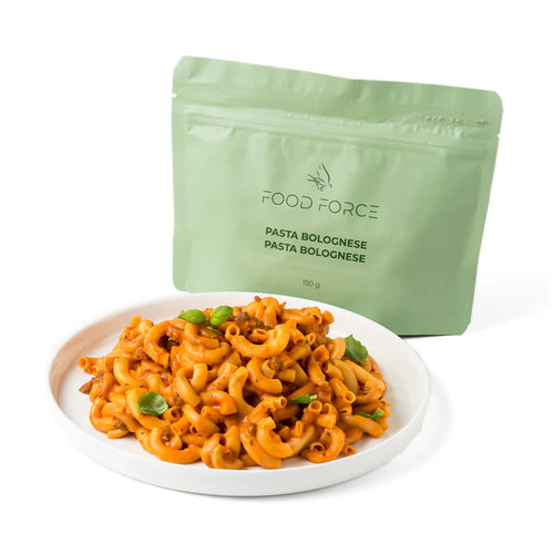 Food Force Pasta Bolognese served on a plate with pouch in the background