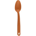 Orange spoon on a white background