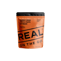 Orange Real On The Go energy drink with a taste of peach package with black text on a white background